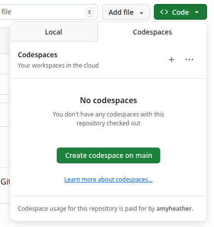 Screenshot of repository showing Code > Codespaces > Create codespace on main